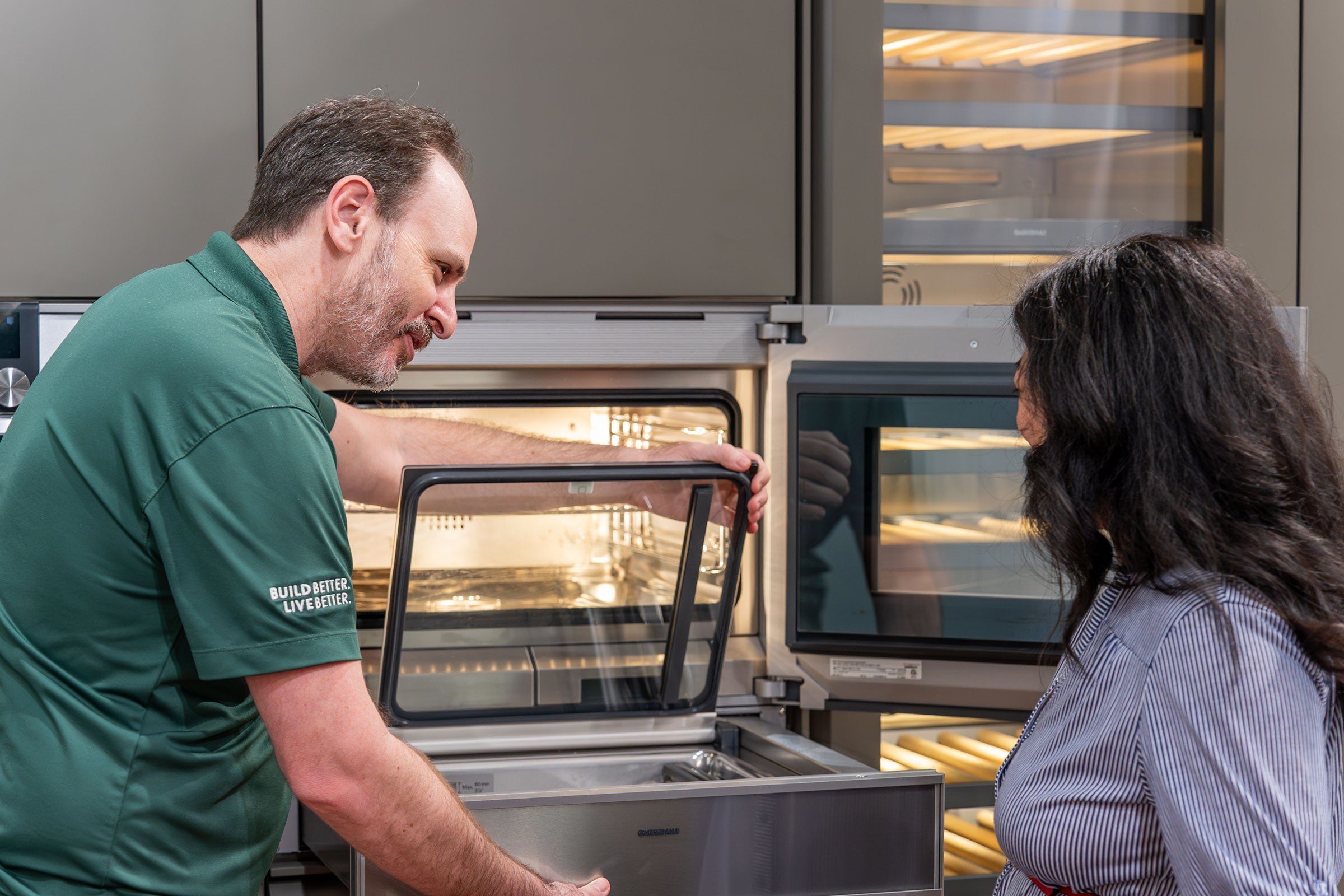 Appliance Specialist shows customer the features of the Gaggenau Oven